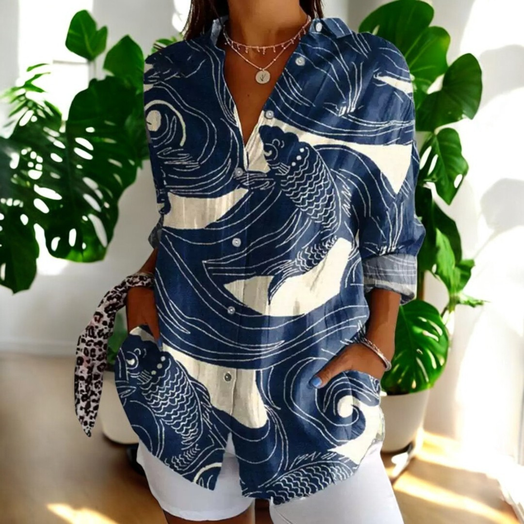 Elegant kvinne bluse med fargerikt blomsterprint, perfekt festtopp og hverdagsbruk.