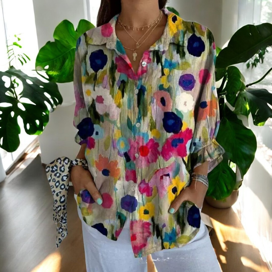 Klassisk fargerik vintage bluse med blomsterprint, elegant festtopp for kvinner.