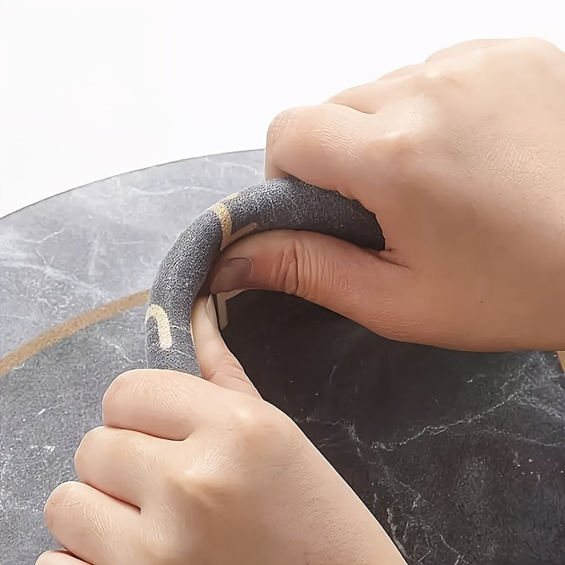 L-formet kjøkkenmatte med optimal komfort og sklisikkerhet, tilgjengelig i beige og mørkegrå.
