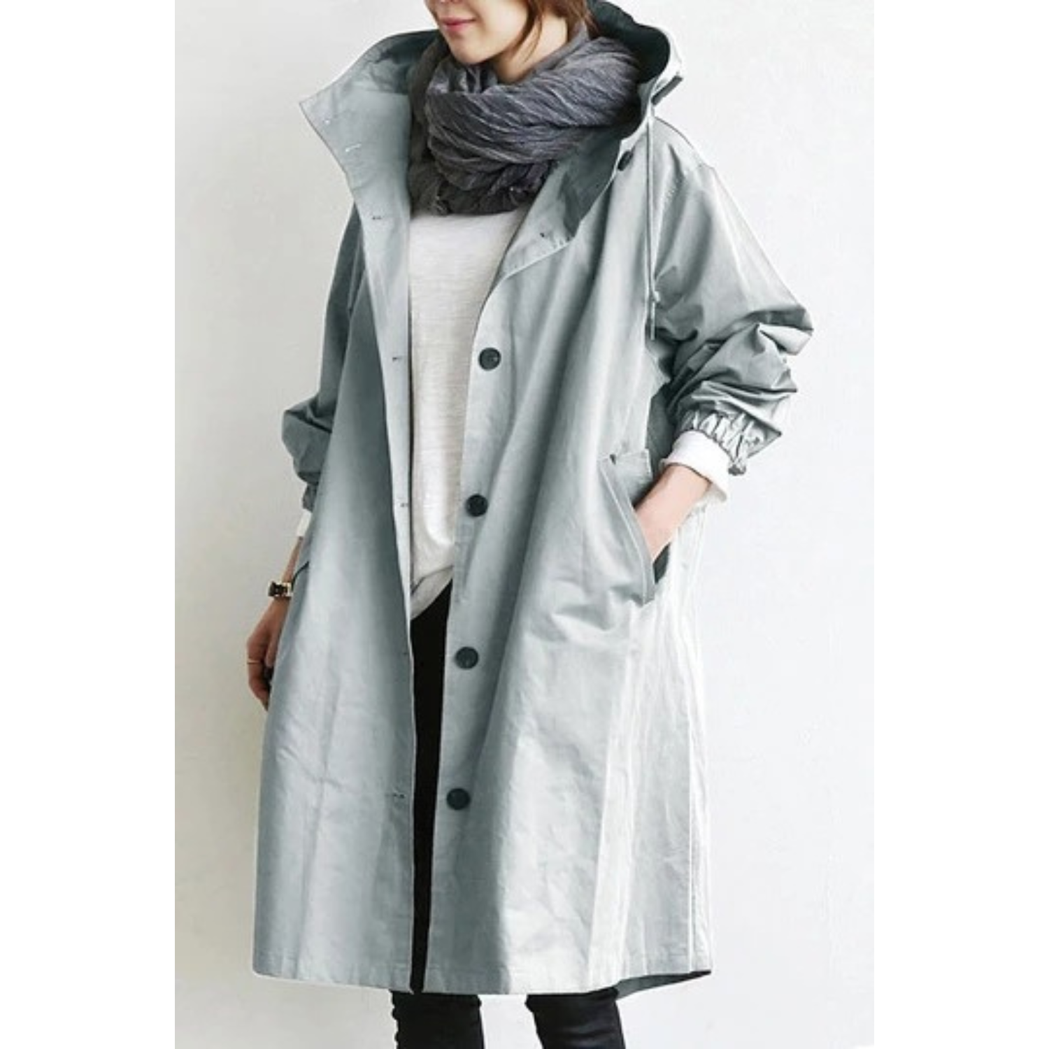 Kvinners lange trenchcoat med hette, komfortabel og stilfull for hverdagsbruk.