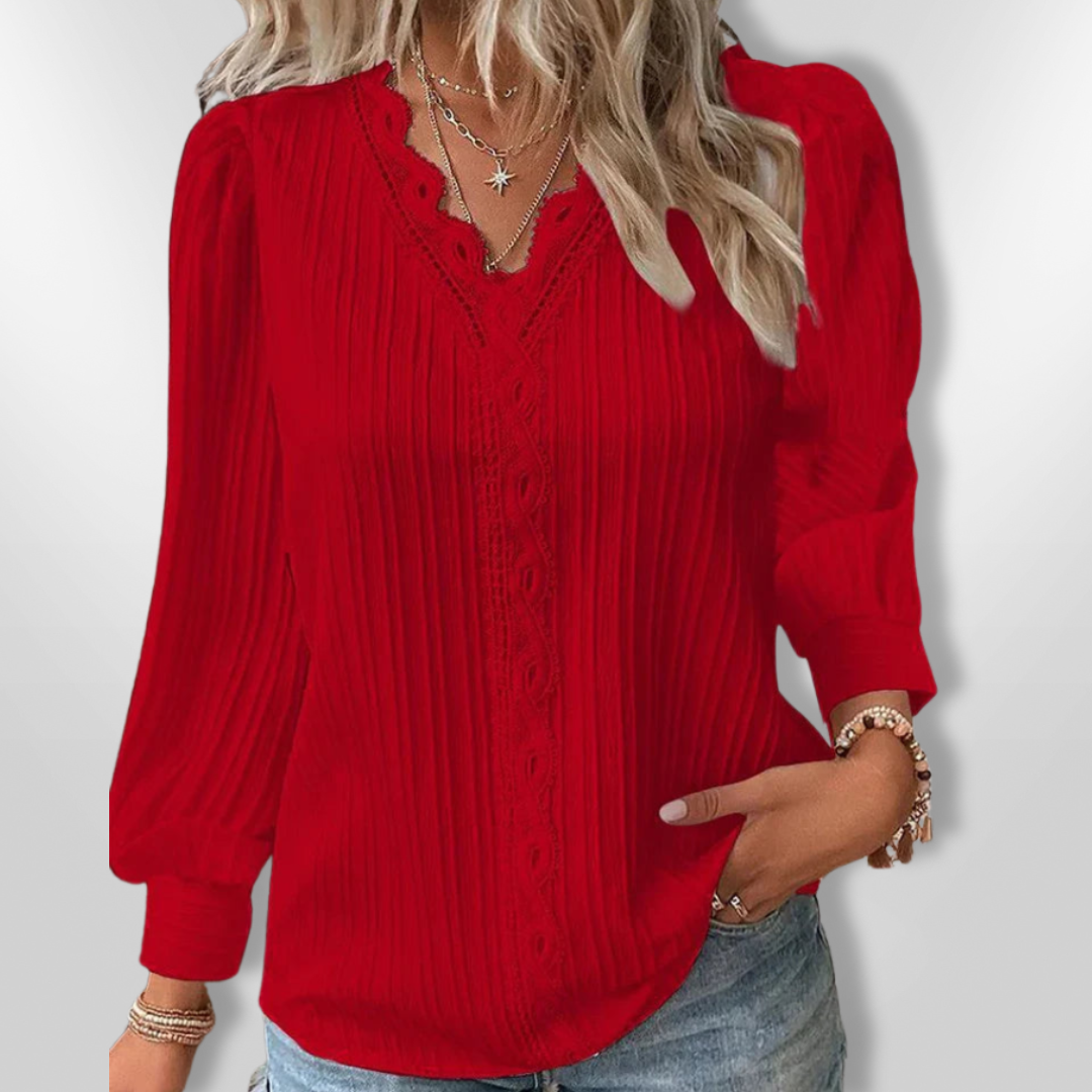 Romantisk langermet kvinnebluse med stilige detaljer, en elegant topp for moderne dameklær.