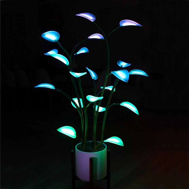 Elegant LED-lampe i grå planteform med fargeveksling. Ideell for stilren hjemmedekor.
