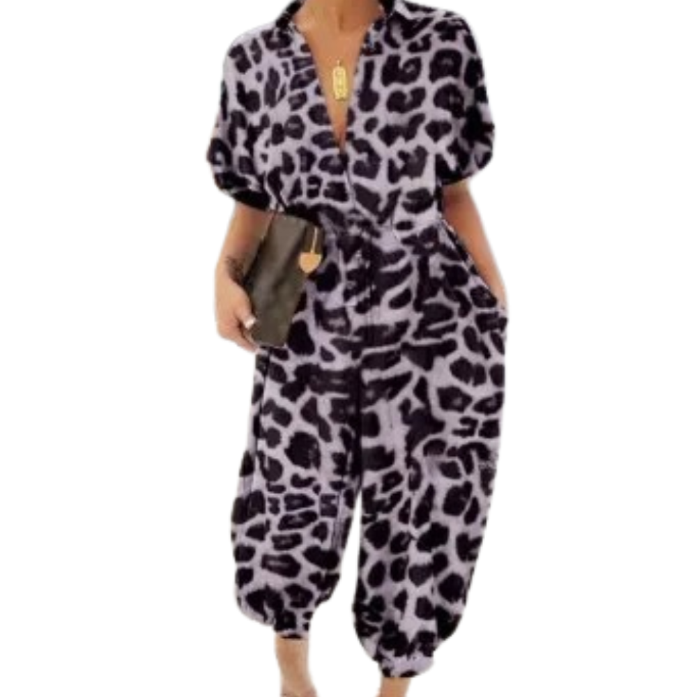 Elegant dame romper med leopardmønster, V-hals og stilige knutedetaljer. Ideell for fest eller casual bruk.
