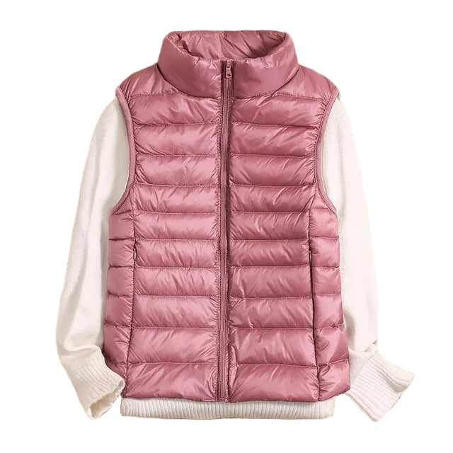Lett dunjakke vest for damer, komfortabel og stilfull yttertøy. Perfekt for lagpålag om våren og høsten.