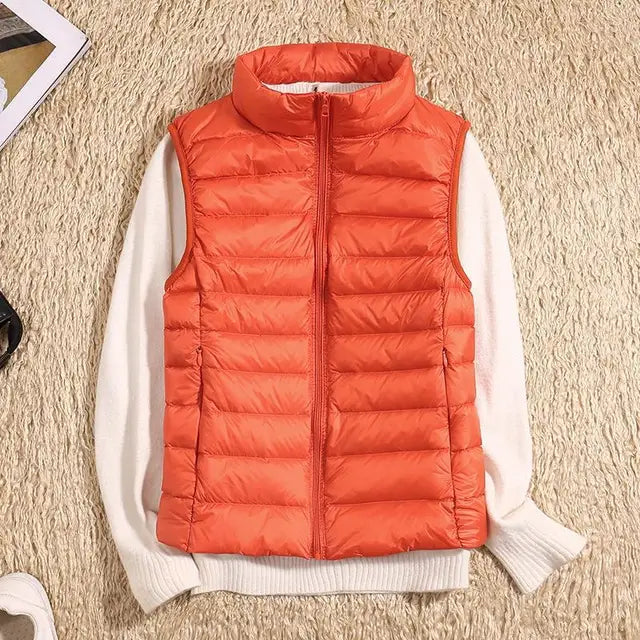 Komfortabel dunjakke vest for kvinner, lettvekts design for hverdagsbruk og lagpålag stil.