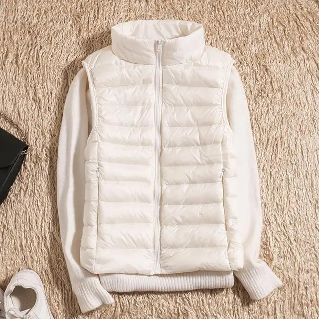 Elegant og lett dunjakke vest for damer, perfekt for aktive dager og stilfullt yttertøy i skiftende vær.