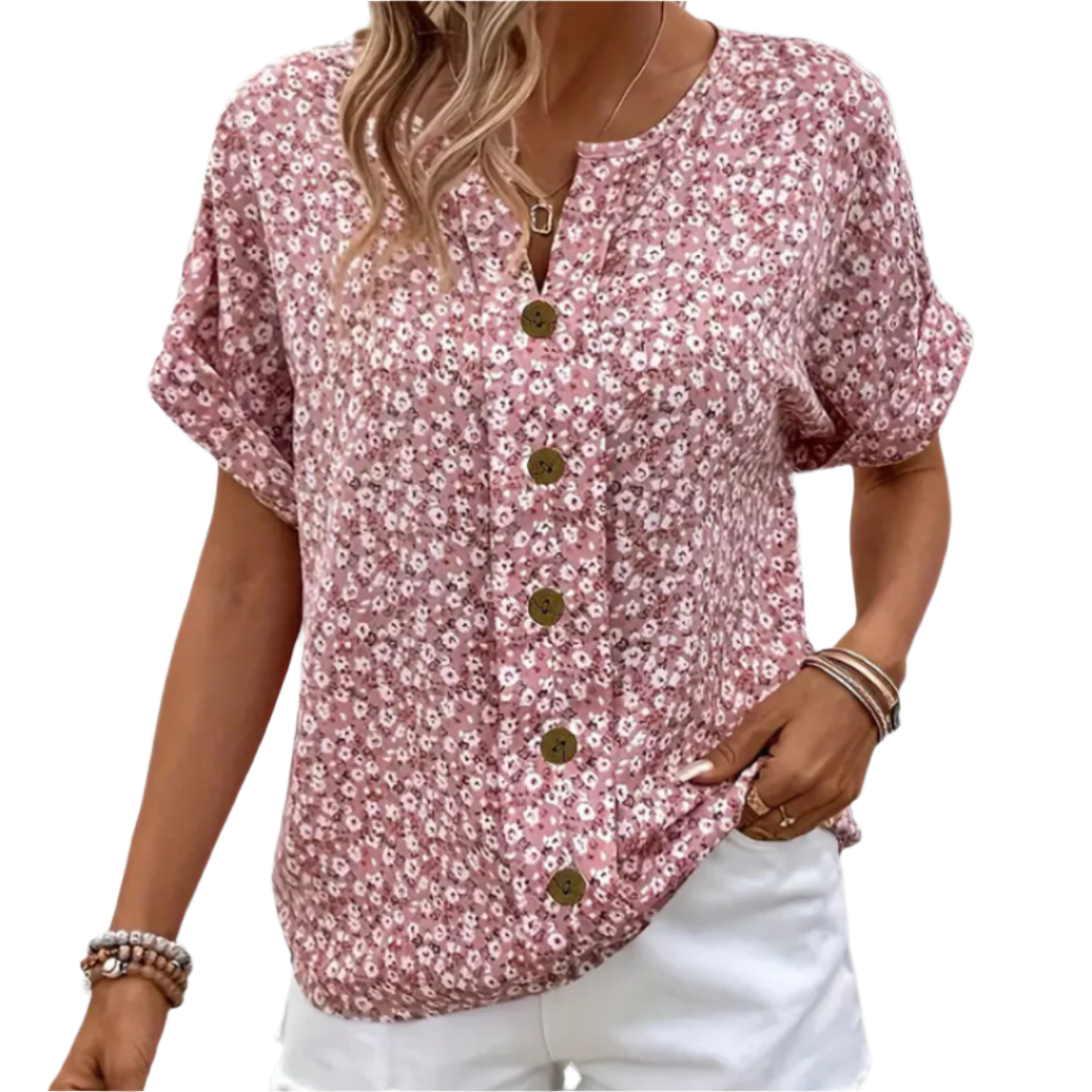 Lett kvinnebluse med elegant blomsterprint. Perfekt vårbluse for feminin og avslappet hverdagsstil.