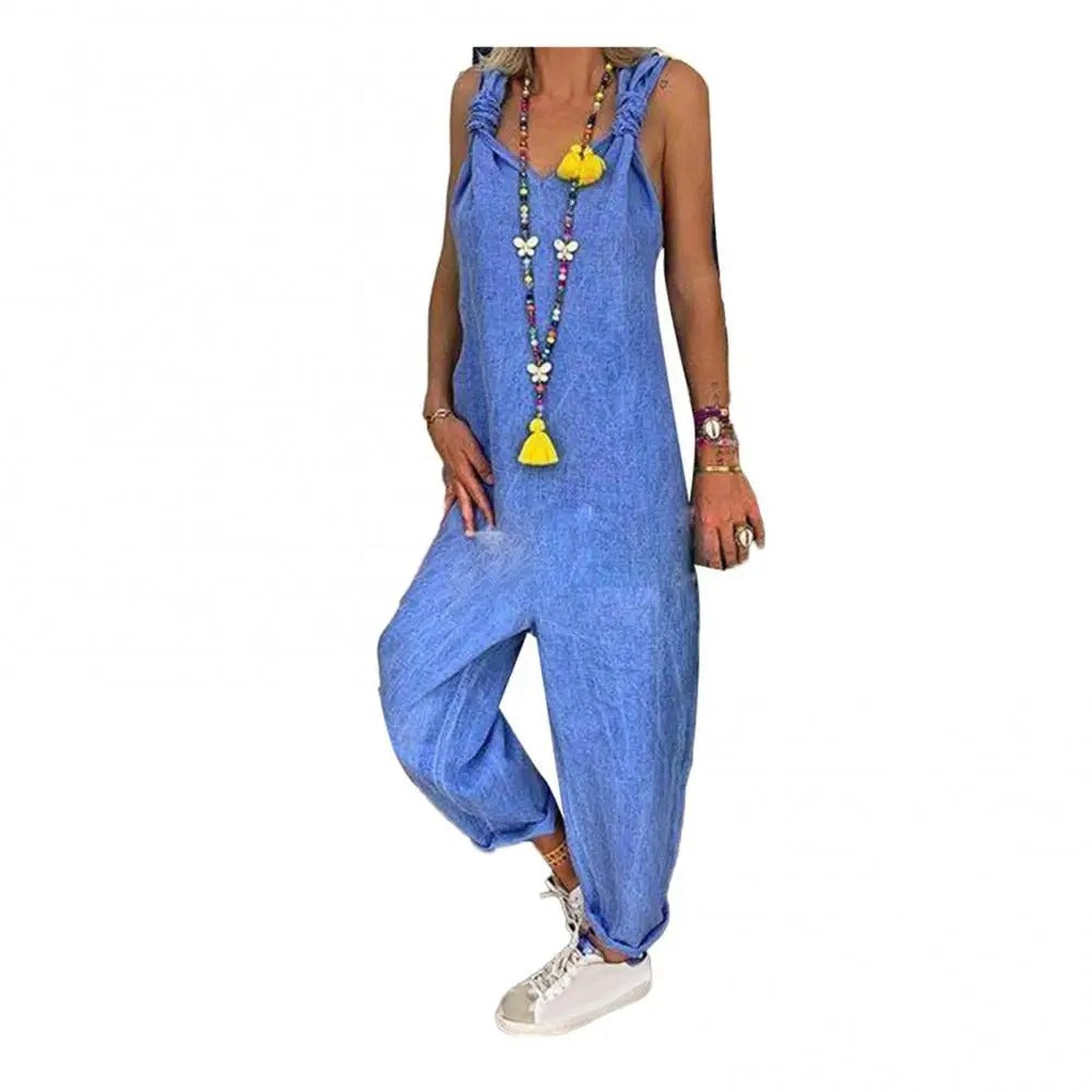 Komfortabel damejumpsuit i løs passform med elegante knytestropper og åpen rygg. Ideell for casual stil.