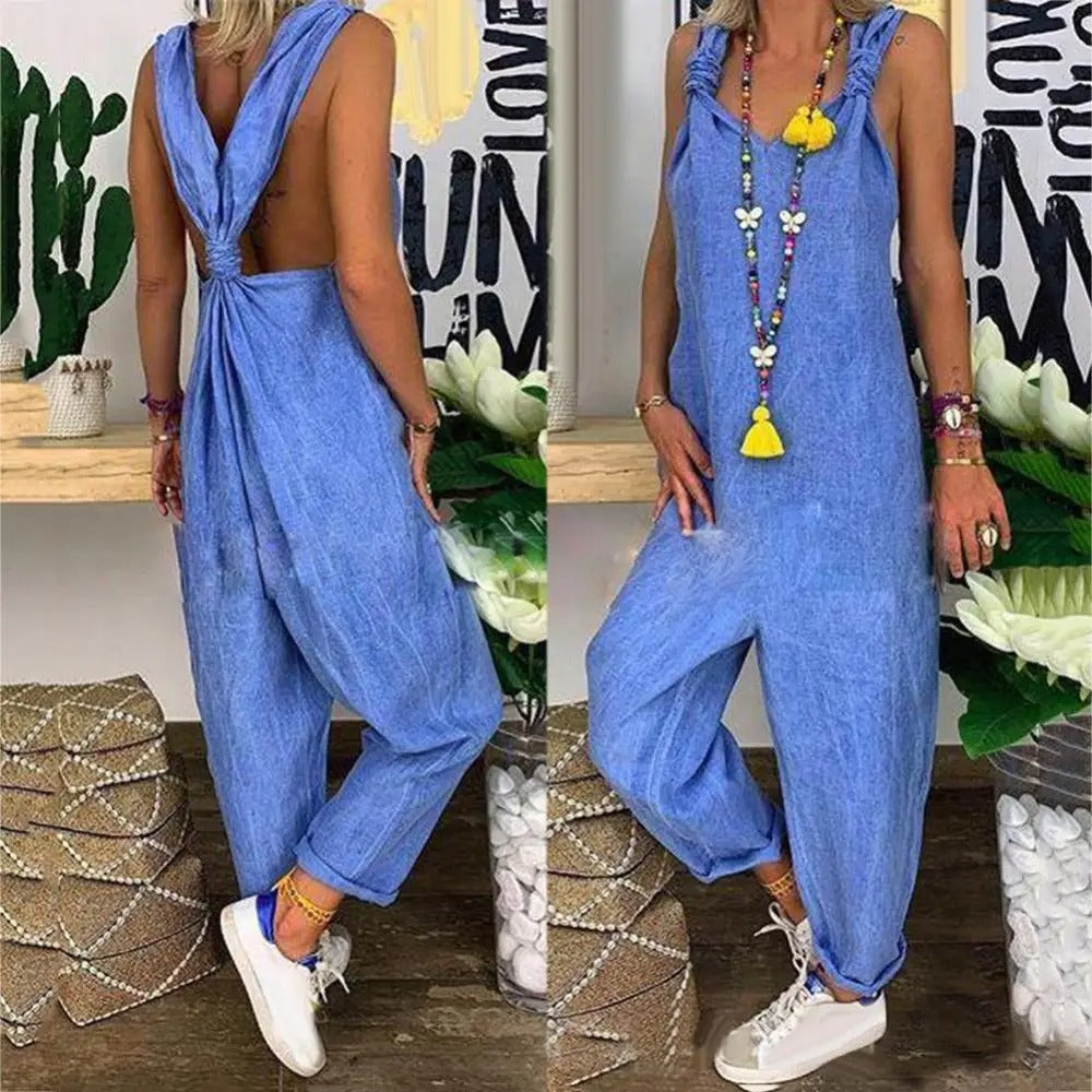 Motebevisst jumpsuit: Dameklær med løs passform, knytestropper, og ryggløs detalj for en moderne look.