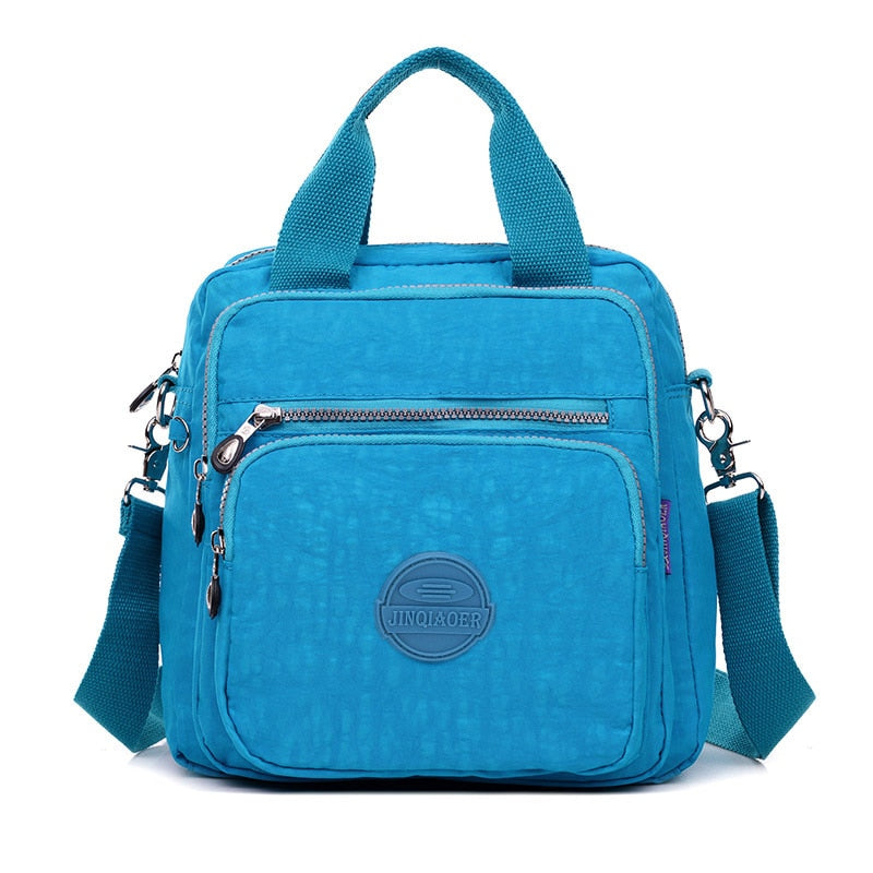 Elegant dame crossbody-veske i robust nylon, din perfekte hverdagsveske.