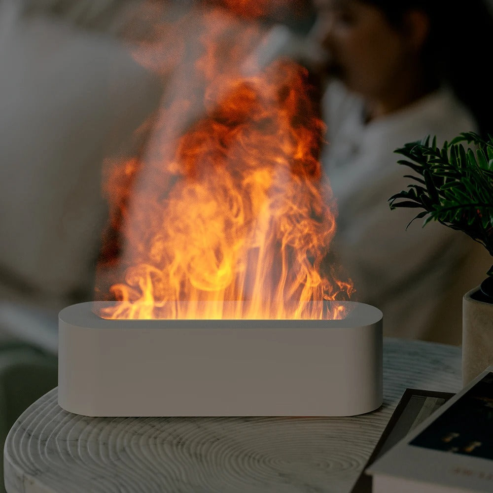 Stillegående luftfukter og aromadiffusor med flammeeffekt. Forbedrer inneklima og gir hjemmekos.