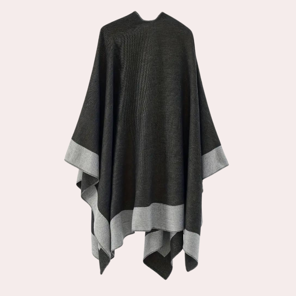 Komfortabel og allsidig kvinne poncho i svart-gul design, ideell for vår, høst og kjølige vinterdager.