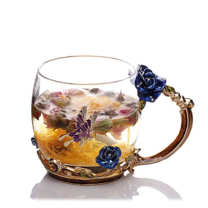 Luksuriøst krystallkrus med elegant håndmalt blå rose; perfekt for te, kaffe eller hjemmedekor.