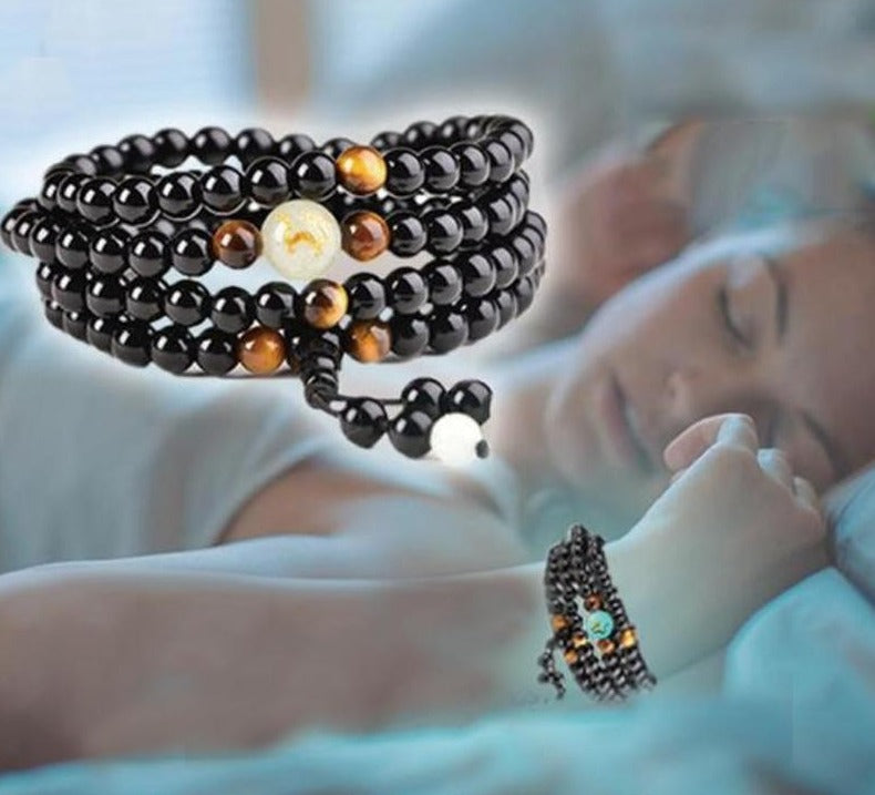 Elegant unisex obsidian armbånd med unikt lysende drage design, et kraftfullt smykke.