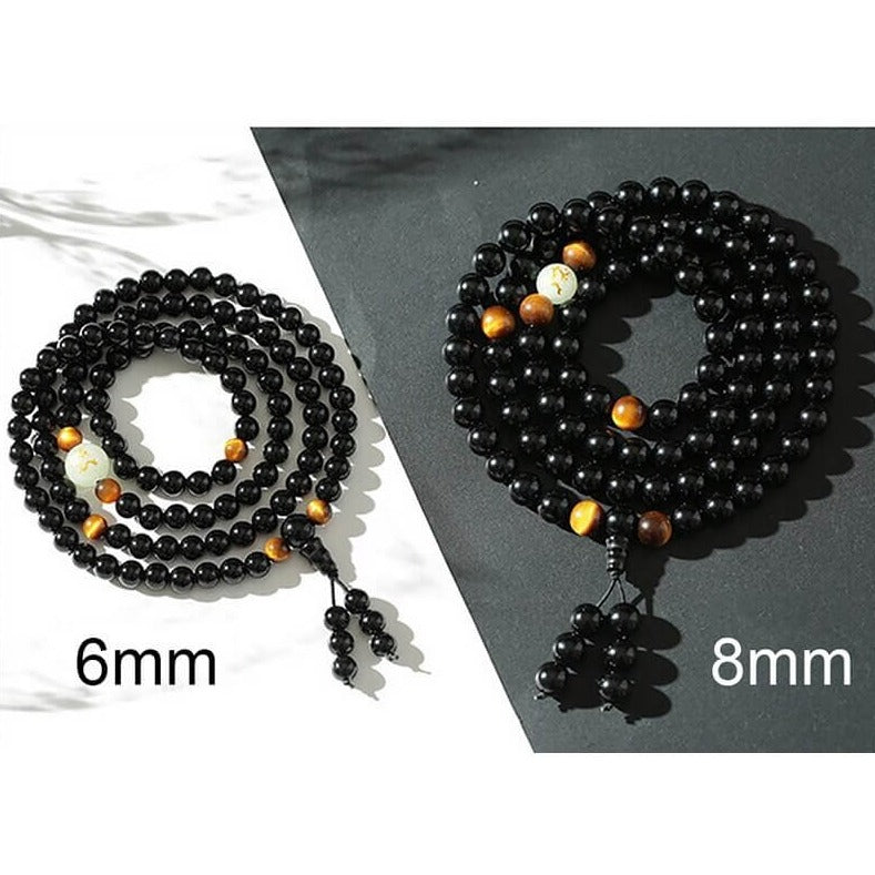 Trendy unisex armbånd med glødende drage og beskyttende obsidianperler.