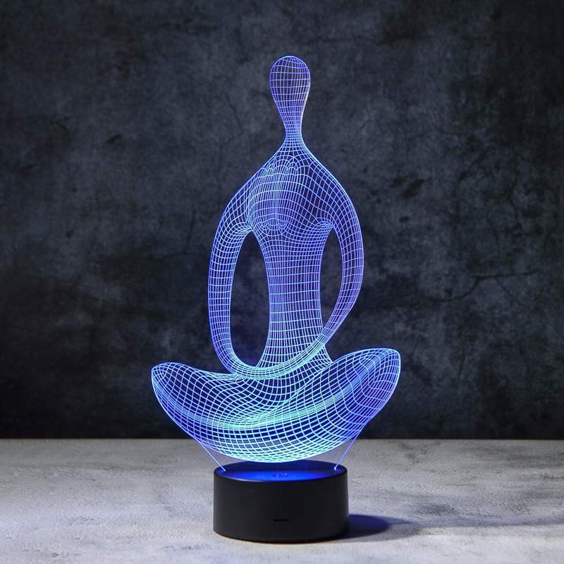 Designlampe med 3D yoga-figur. Gir et unikt lys og skaper en fredelig atmosfære.
