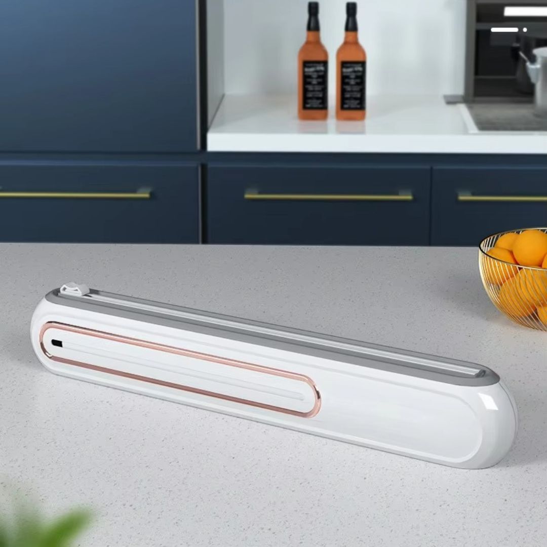 Kjøkkenorganisering: Brukervennlig magnetisk dispenser med folie for mat, lett å trekke ut og kutte. Smart kjøkken.
