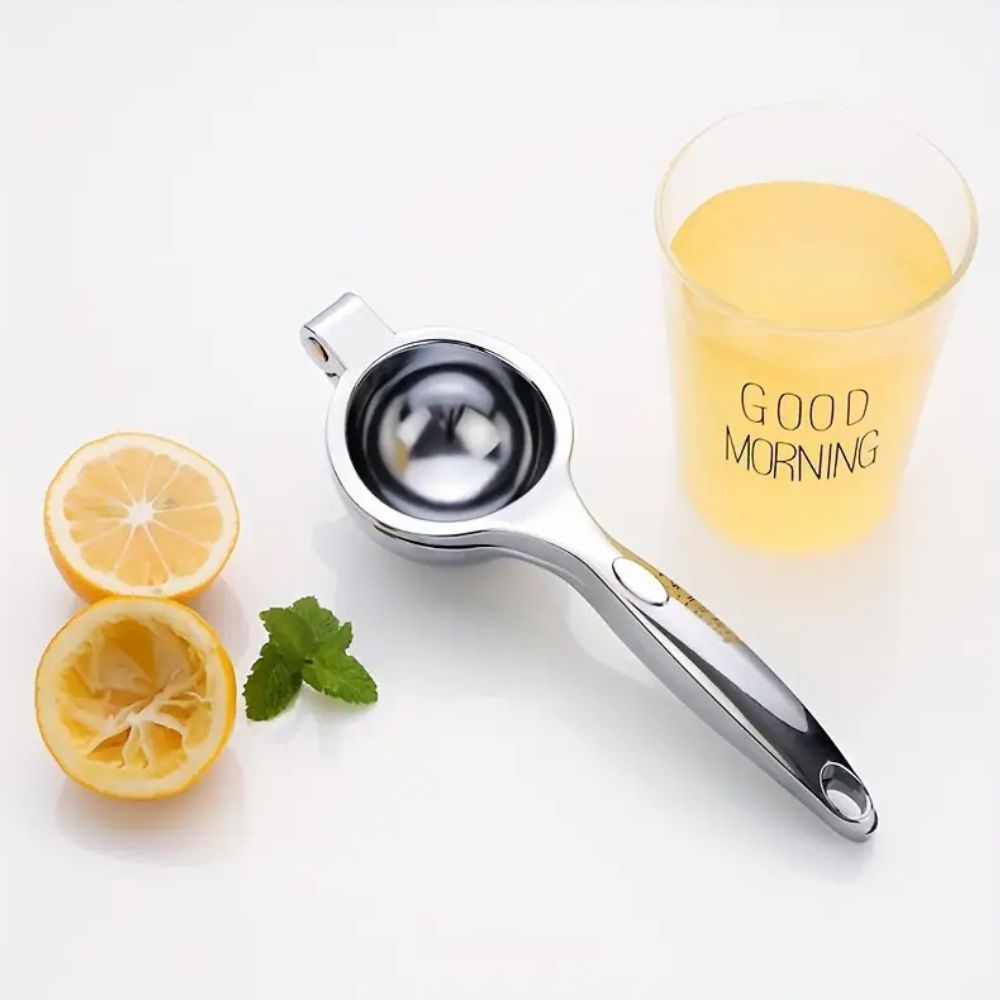 Rustfritt stål manuell juicepresse som lager fersk juice. Solid og lett å bruke kjøkkenutstyr for sitrusfrukter.
