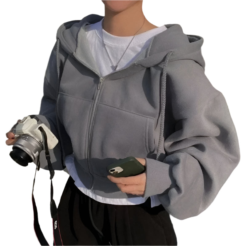Trendy oversized crop hettegenser til dame, perfekt for avslappet vår- og høstbruk og mote.
