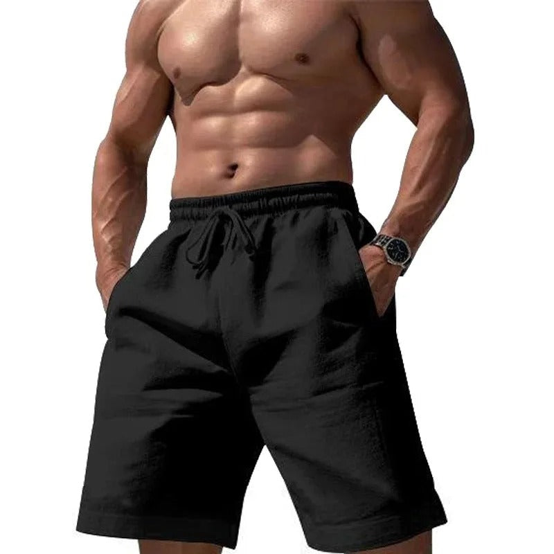 Menns elastiske fritidsshorts i en nøytral farge. Allsidig buksealternativ for sommeren, for hverdagsbruk.