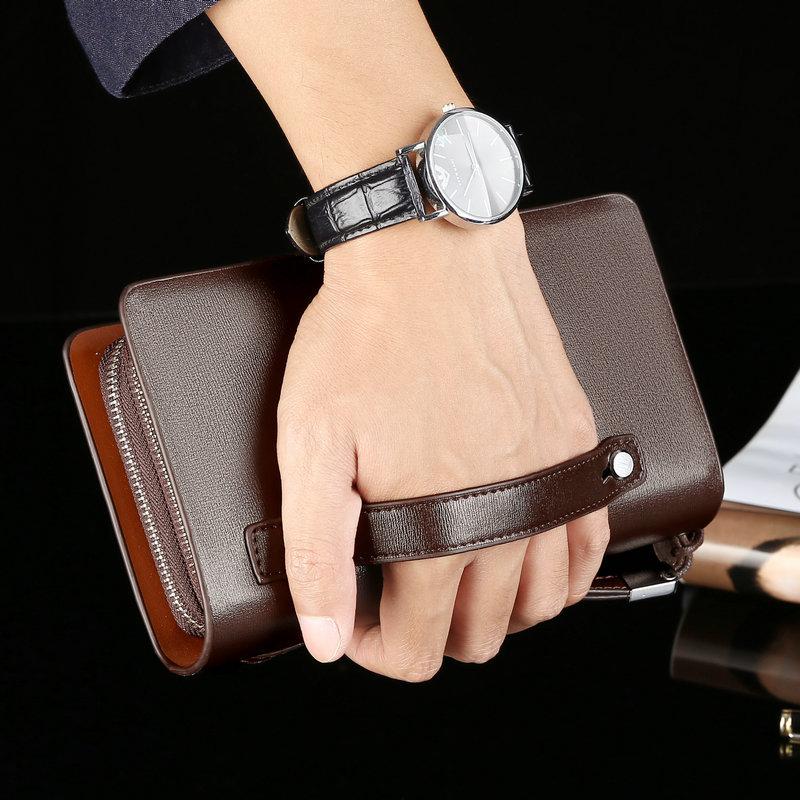 Elegant menns herreveske i klassisk skinn, en stilig brun clutch for alle anledninger.