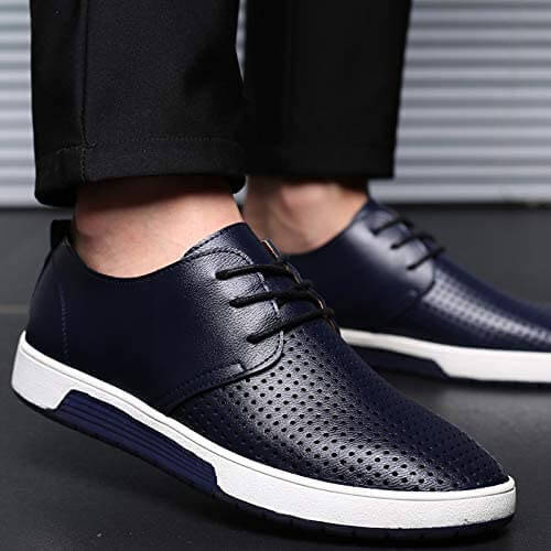 Marineblå oxfordsko, semi-formelle herresko som gir en elegant touch til antrekket.