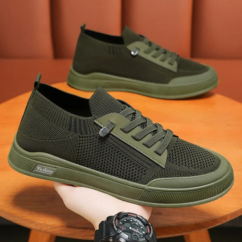 Frontbilde av pustende herre sneakers. Perfekt for hverdagsbruk og en aktiv livsstil.