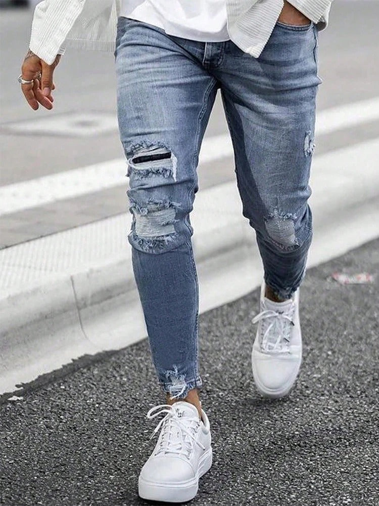 Komfortable rippede skinny jeans for menn, ideell for fritid og en dristig motestil.