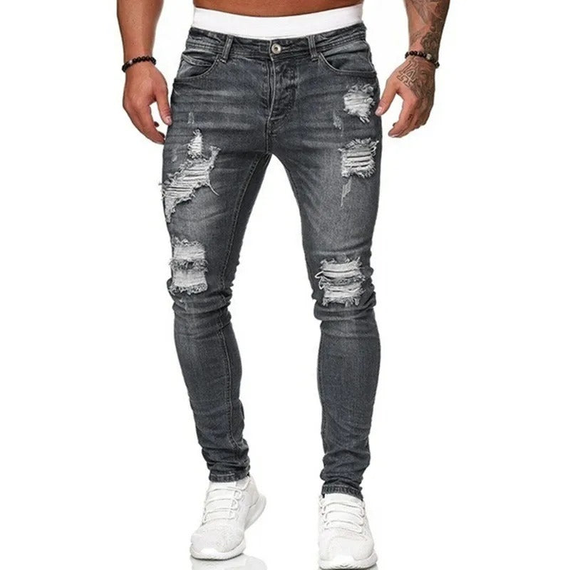 Blå menns skinny jeans med slitte detaljer og rippede partier, moderne gate stil.
