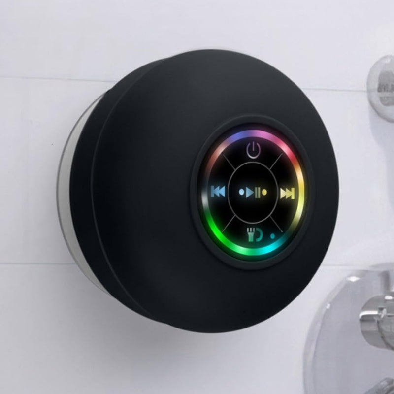 Grønn mini Bluetooth høyttaler, vanntett med LED-lys for musikk i badet.