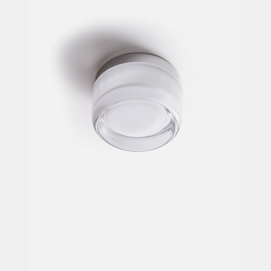 Allsidig DimpleGlow vegglampe, moderne LED belysning som passer i både stue og soverom.
