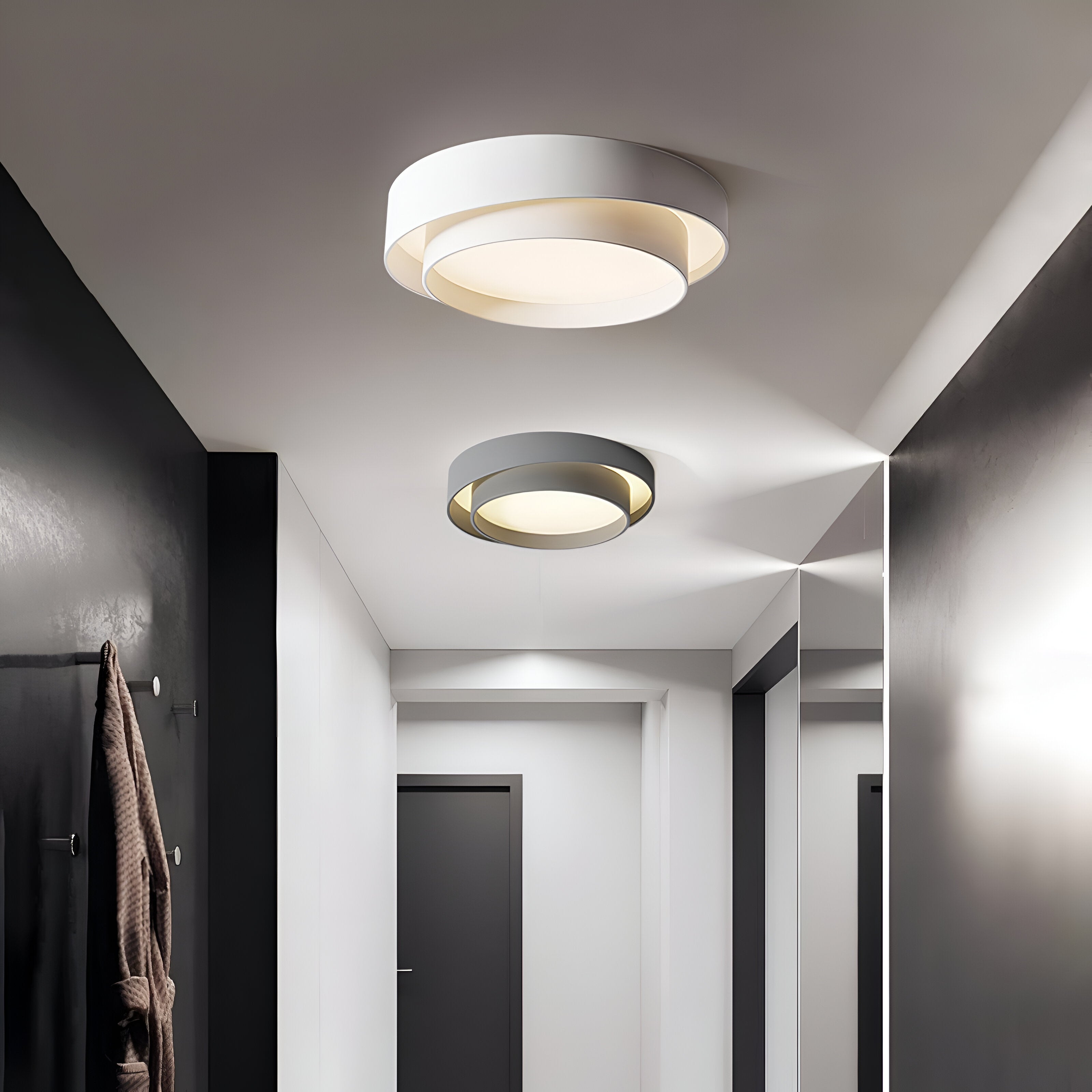 Moderne taklampe i LED, sirkulær form og dobbeltlagsdesign, passer perfekt for stilrent interiør.