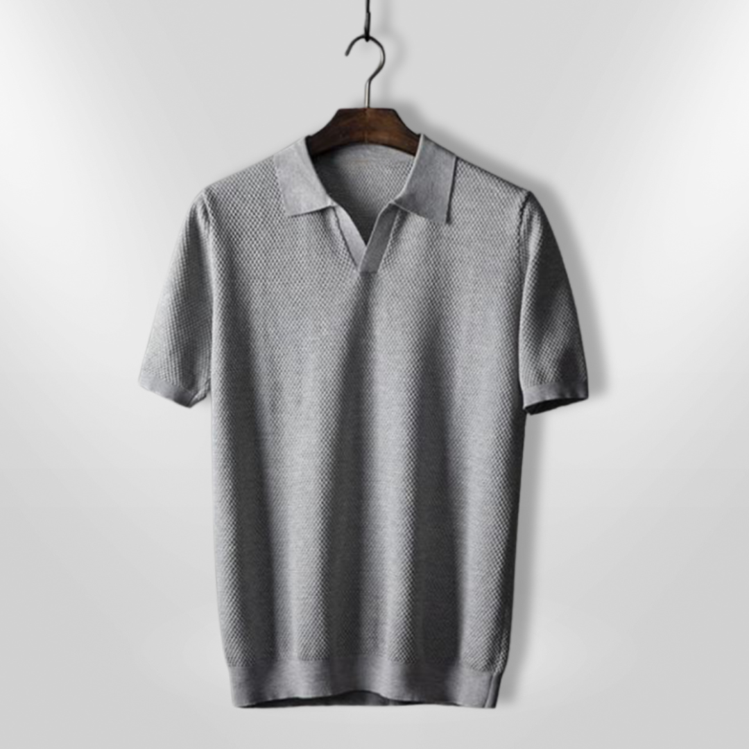 Komfortabel grå herre polo med pustende stoff og moderne stil, ideell for casual og stilfull hverdagsbruk.