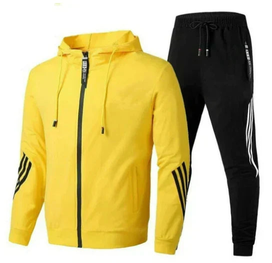Mann i moderne treningssett, aktivtøy for menn, viser bevegelsesfrihet og sporty stil under trening.