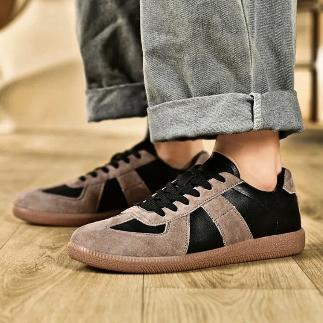 Komfortable fritidssko; moderne herresneakers med fleksibel gummisåle for aktive dager.