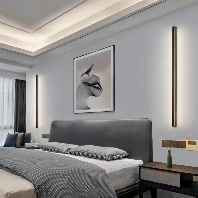 Stilren hvit LED vegglampe. Minimalistisk design for moderne og energieffektiv innendørs belysning.