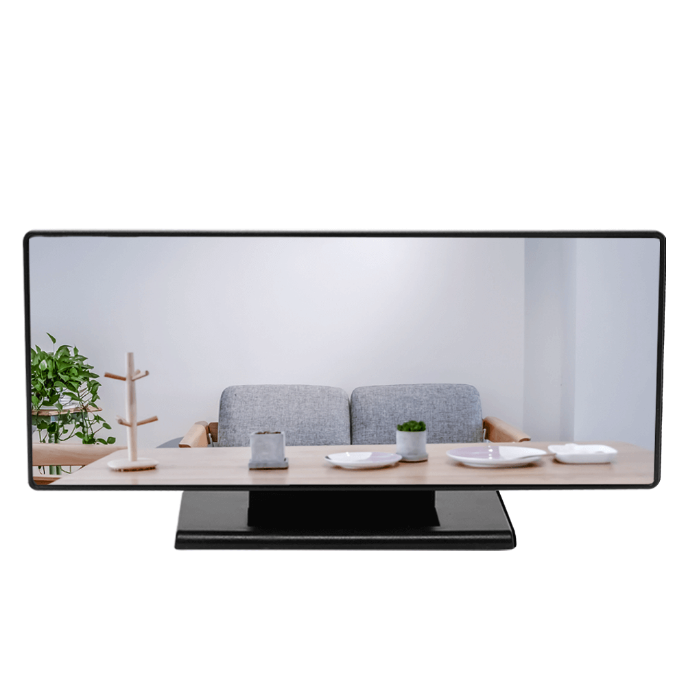Enkel og elegant LED vekkerklokke med speilskjerm som reflekterer omgivelsene. Digital og funksjonell.