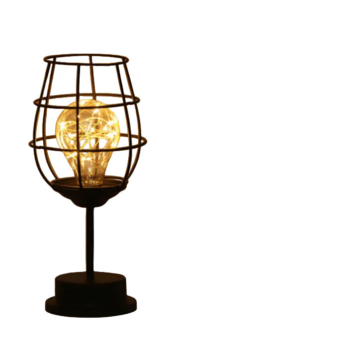 Moderne svart bordlampe med unike former, perfekt som dekorativ belysning for stuen.