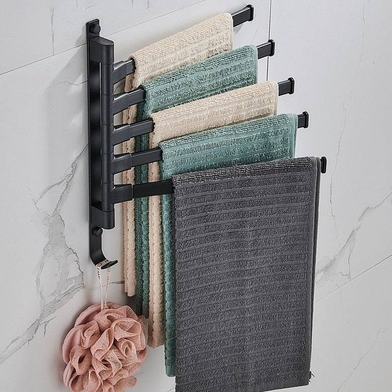 Minimalistisk, veggmontert håndkleholder med 5 armer i matt svart finish for et ryddig baderomsinteriør.