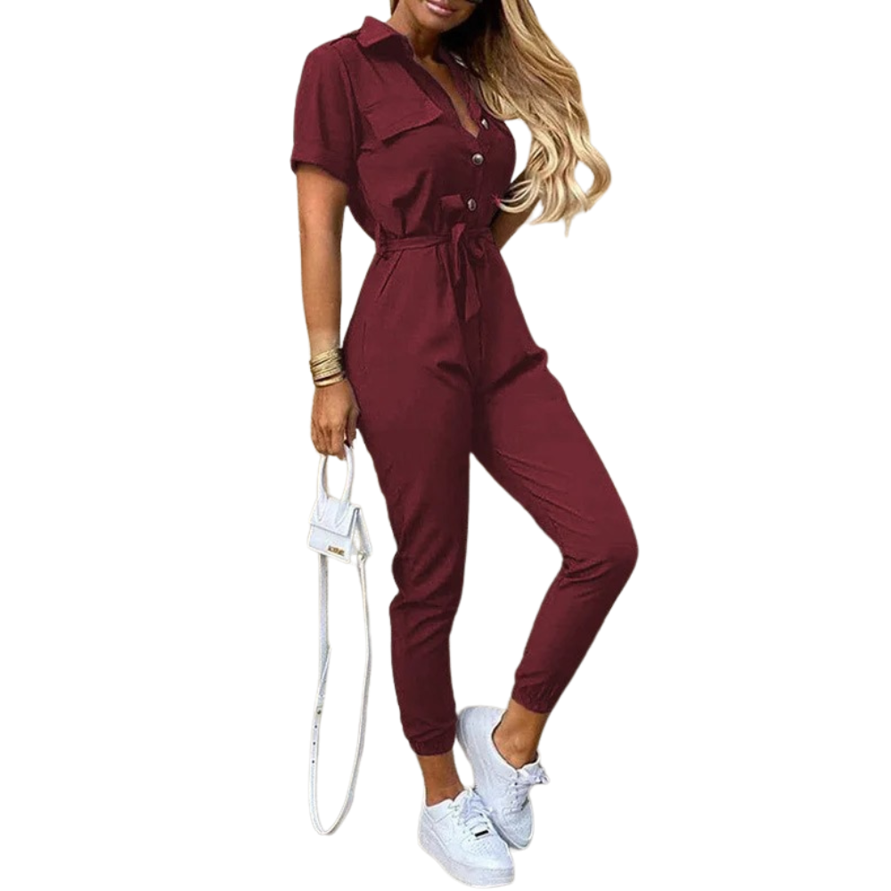 Monokromatisk jumpsuit med belte, perfekt for en sofistikert stil på jobben.