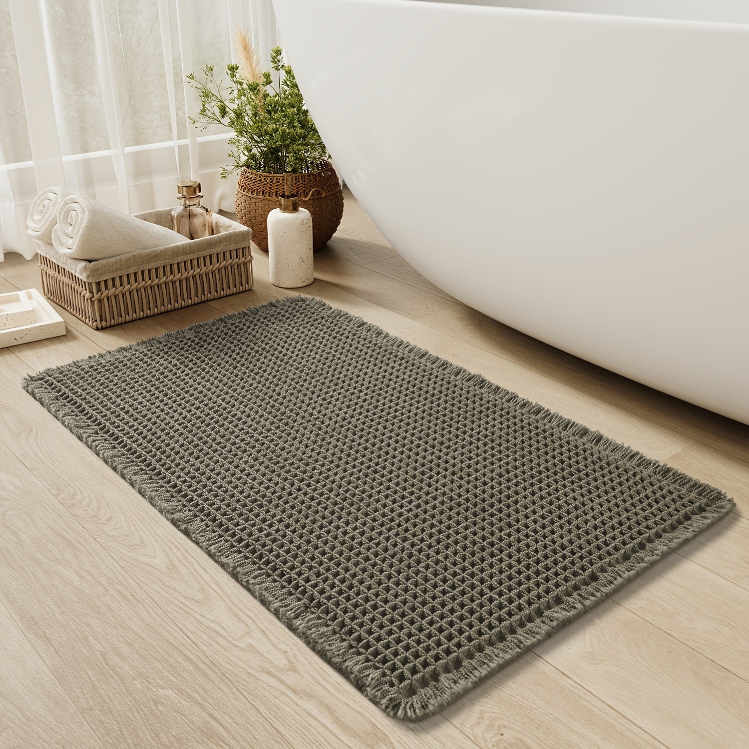 Absorberende og myk badematte i vaffeldesign, ideell for baderommet. Anti-skli og komfortabel gulvmatte.