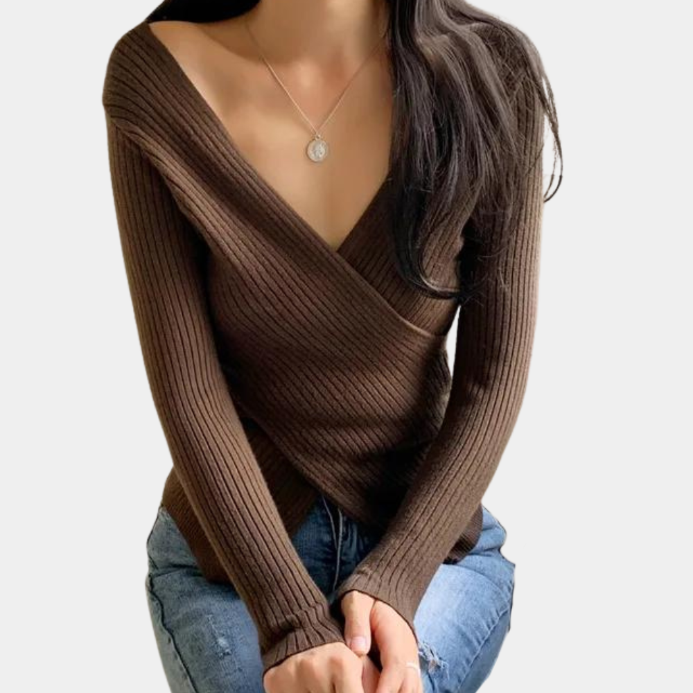 Moderne kvinnegenser med v-hals og chic kryssdetalj. Komfortabel passform for en trendy og stilfull dame.