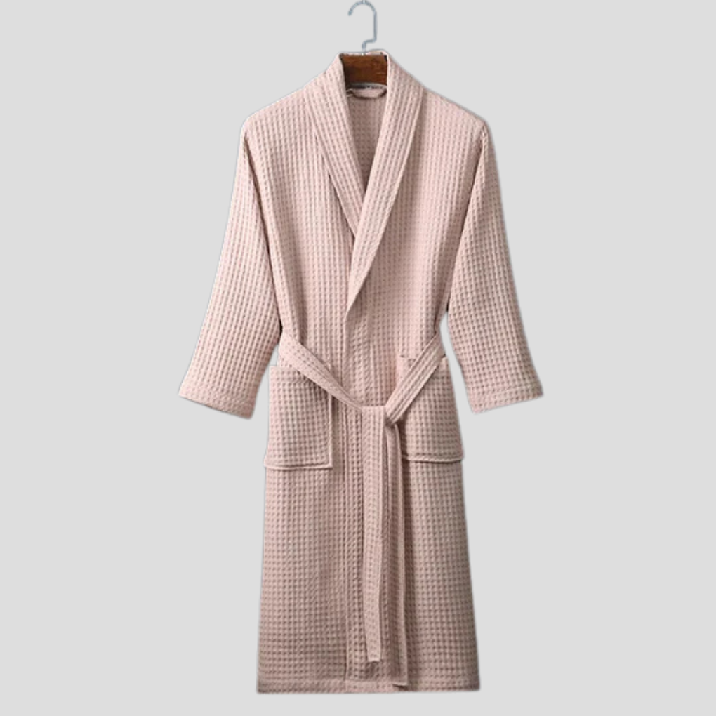 Myk, elegant unisex badekåpe i 100% bomull med knytebelte. Perfekt for avslapning og hverdags komfort.