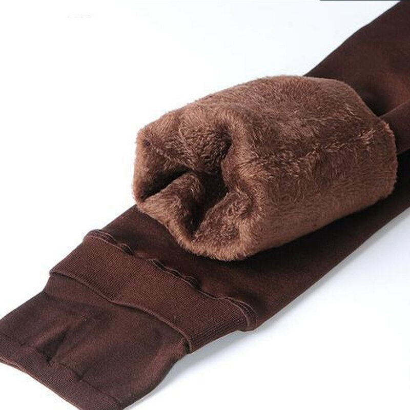 Trendy vinter leggings i marineblå for dame, kombinerer varme, mote og allsidighet. Ideell for kalde dager.