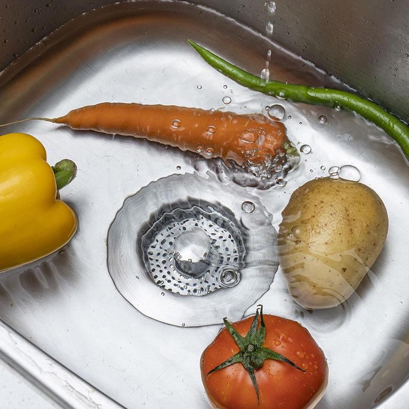 Bilde av ren kjøkkenvask med 3-i-1 universal dreneringssil. Optimal for kjøkkenhygiene.