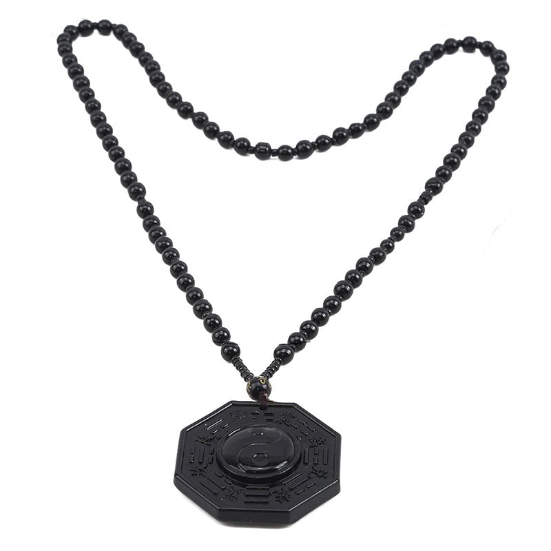 Obsidian Yin Yang halskjede for balanse og beskyttelse. Et unikt unisex naturstein smykke.