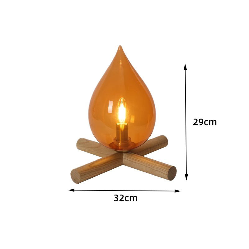 Unik oransje LED-lampe med realistisk flammelampe-effekt. En flott dekorativ gave som lyser opp hjemmet.