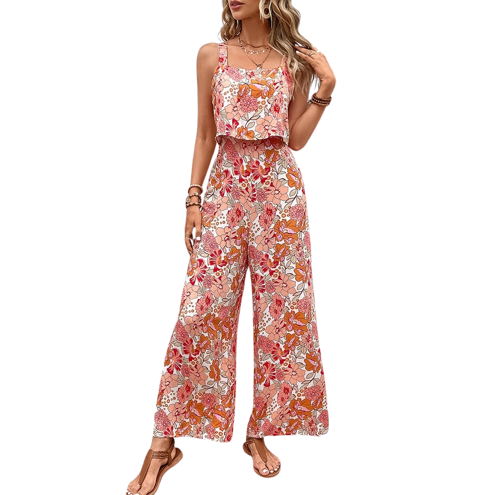 Oransje-lilla blomstret jumpsuit for dame, ryggløs, vide ben, komfortabel sommerdrakt for fritid.