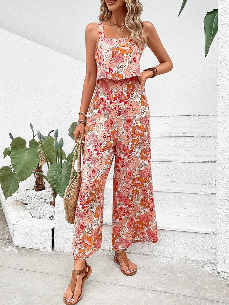 Allsidig oransje-lilla blomstret romper/jumpsuit for dame, komfortabel til sommer, fritid og stil.