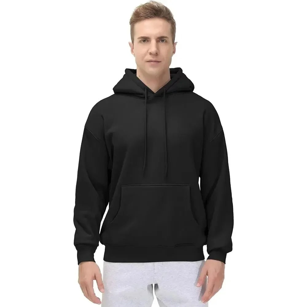 Avslappet og moderne oversized genser med hette, et must-have for herreklær.
